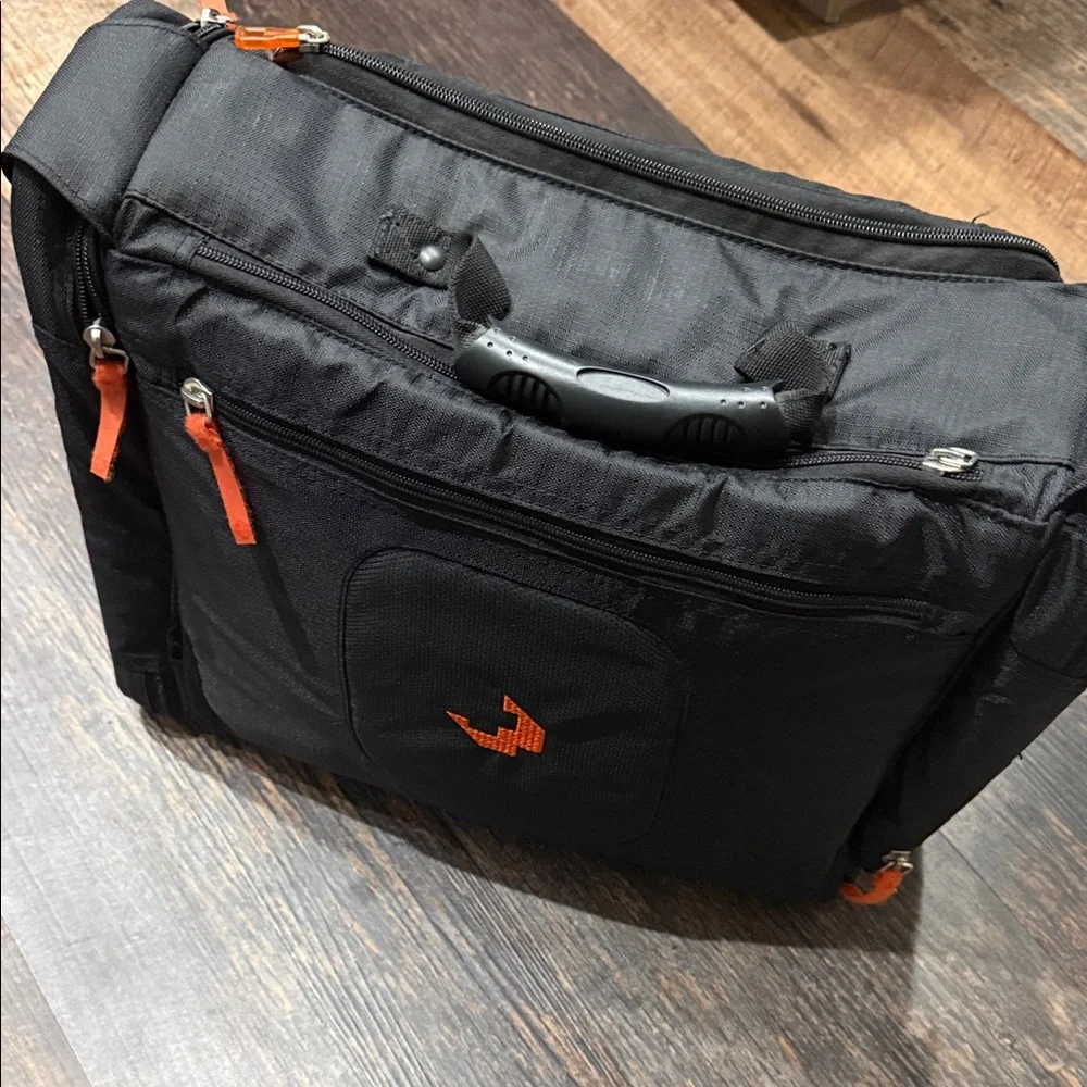 Stylish Spy Optic Inc. Black and Orange Bag/Backpack.